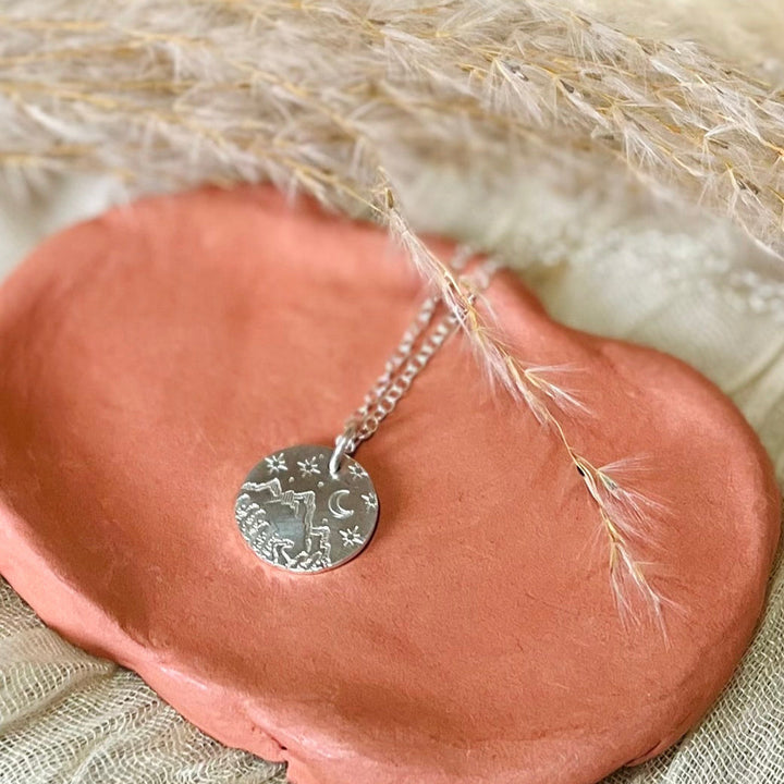 Silver Round Wanderlust Necklace